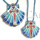 Pendentif coquillage et croix du Chemin de Saint Jacques Compostelle